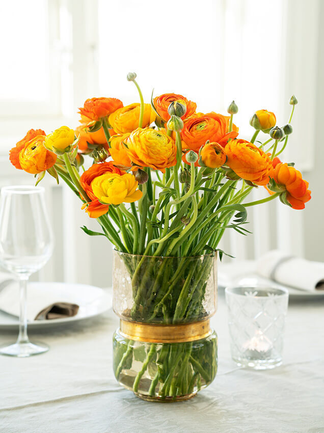 Interflora ranunkler bukett oransje