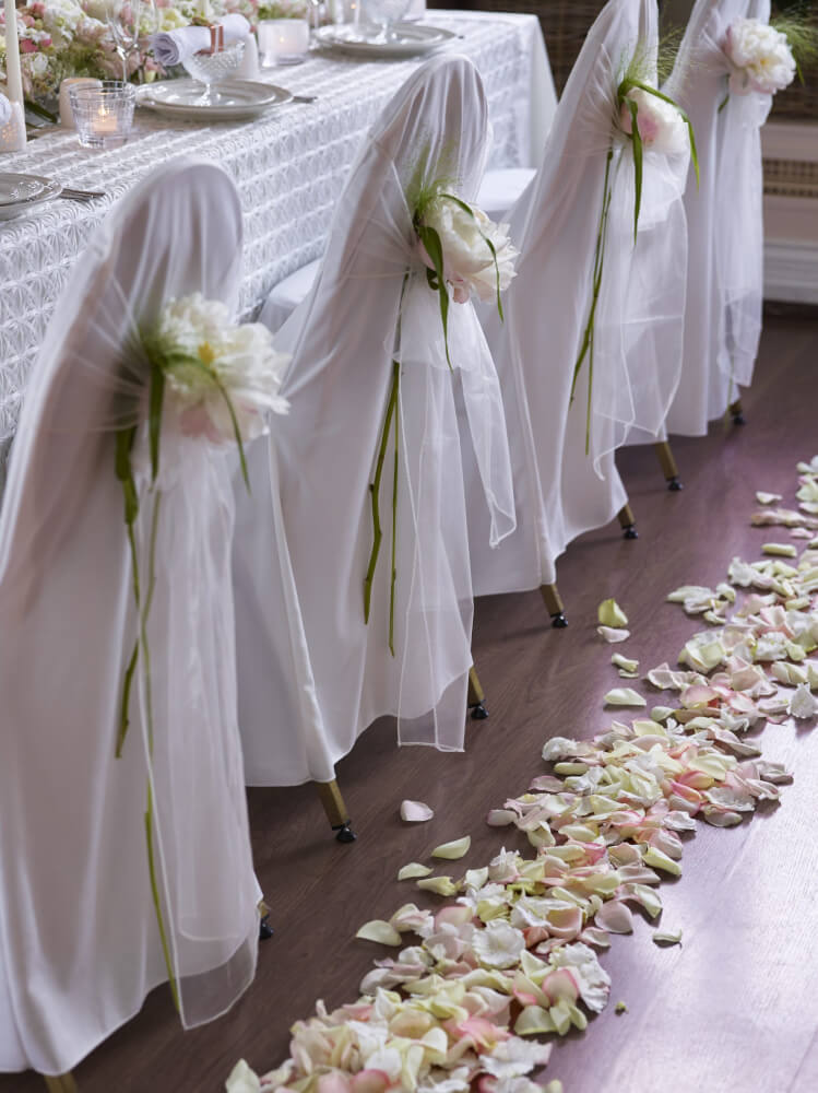 Blomsterdekor bryllupslokalet - Interflora